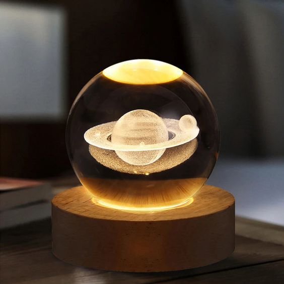 Beautiful 3D Crystal Ball LED Table Lamp With Laser Engraved Solar System Or Galaxy Design On Wooden Base (Random Design)