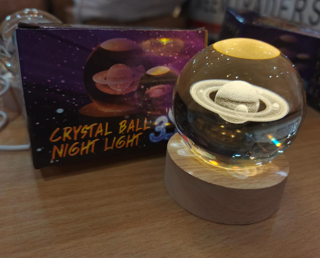 Beautiful 3D Crystal Ball LED Table Lamp With Laser Engraved Solar System Or Galaxy Design On Wooden Base (Random Design)